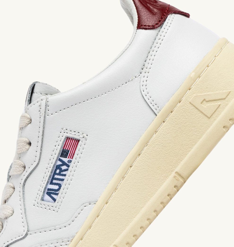 MEDALIST LOW SNEAKERS IN WHITE AND SYRAH LEATHER